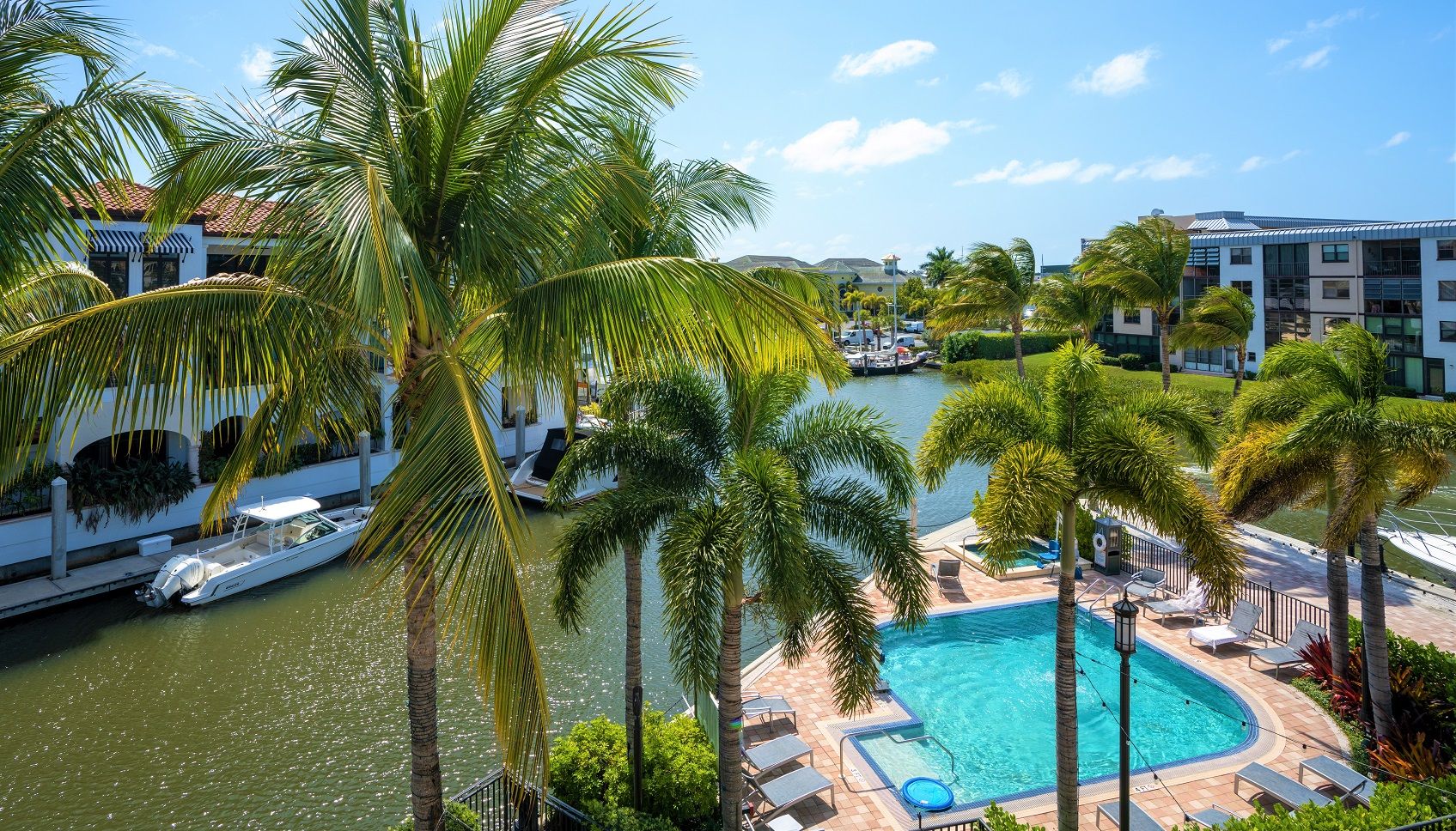 image Aerial view of the marina, pools, and resort