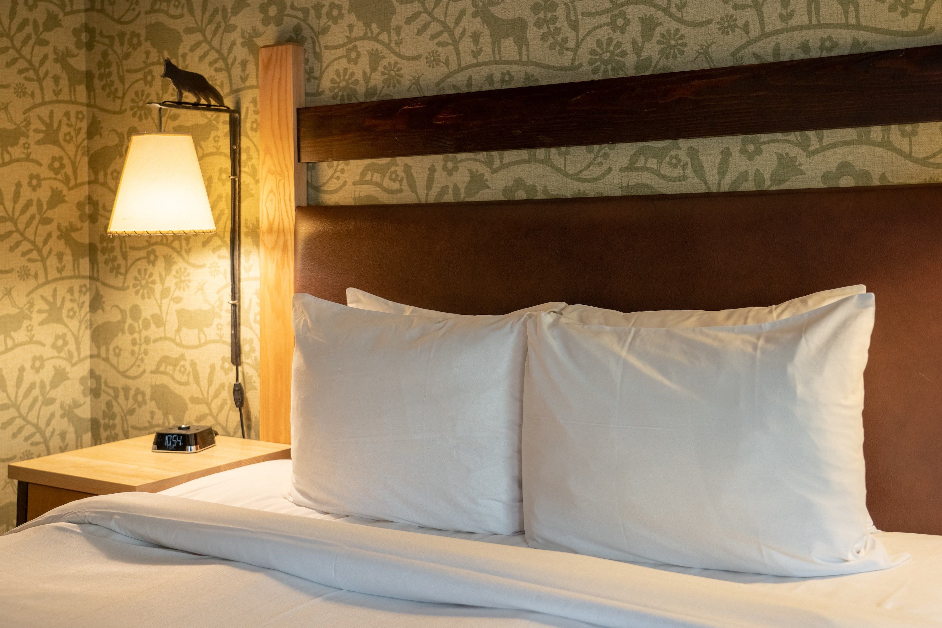 image Drift to sleep in the Mountain Luxury queen-sized bed after a day exploring the Rockies.