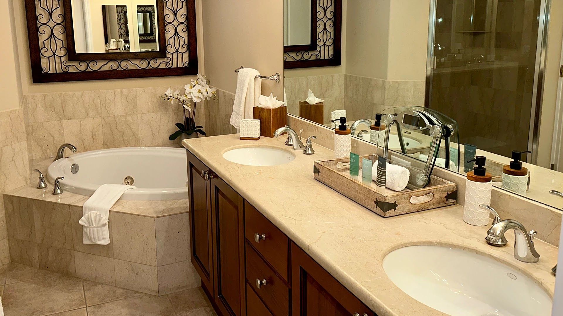 image Bathroom with double sink and faucets