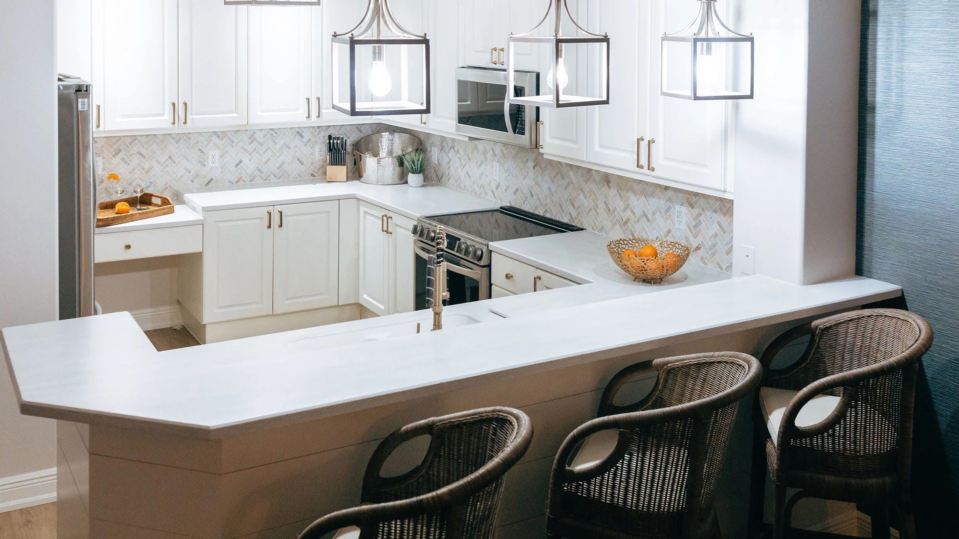 image Kitchen with island, cooktop, and sink