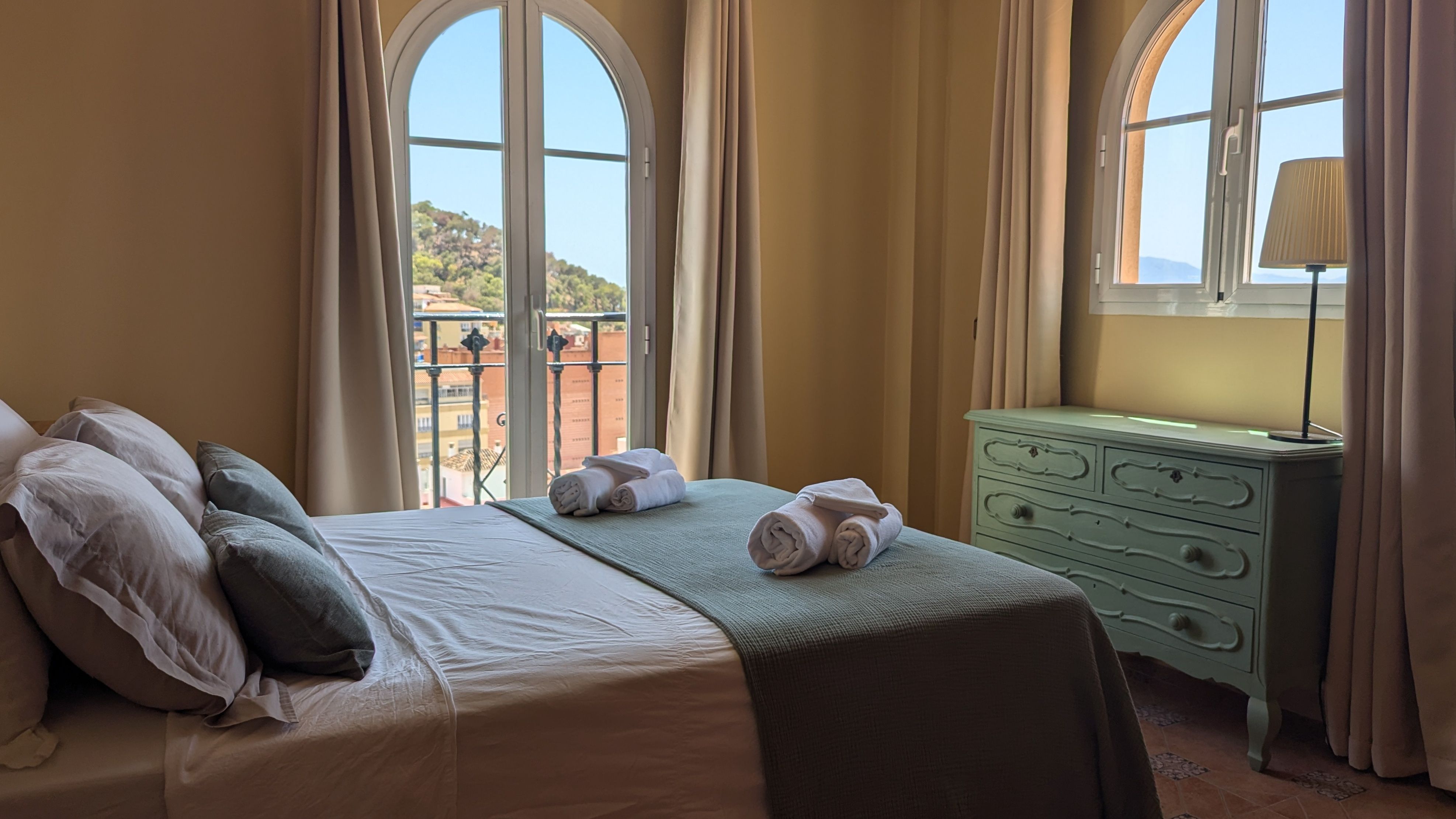 image Bright bedroom with dresser, in the heart of Málaga