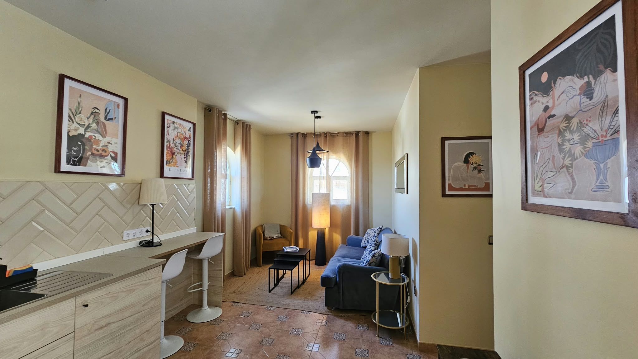 image Living area with sofa and dining table for relaxed stays