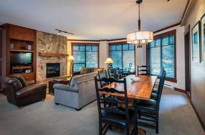 The open concept living area creates a large, bright space.