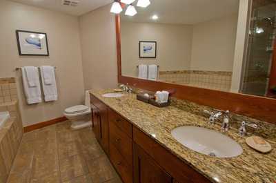 Get ready for the day ahead in the bright bathroom.