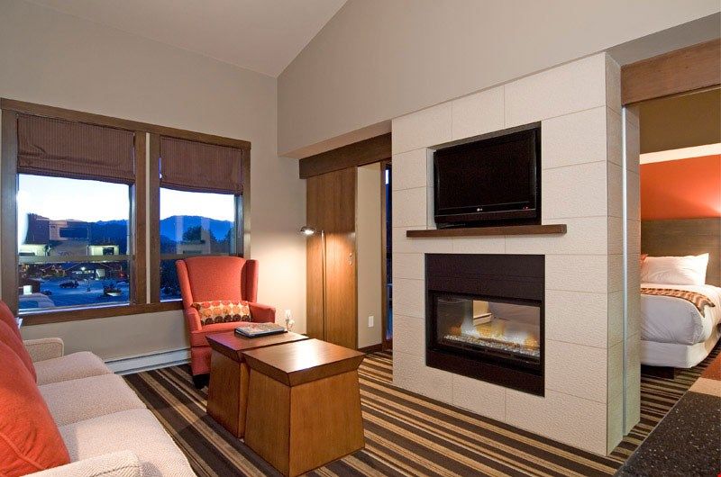 image Kick up your feet and relax in front of the fireplace.