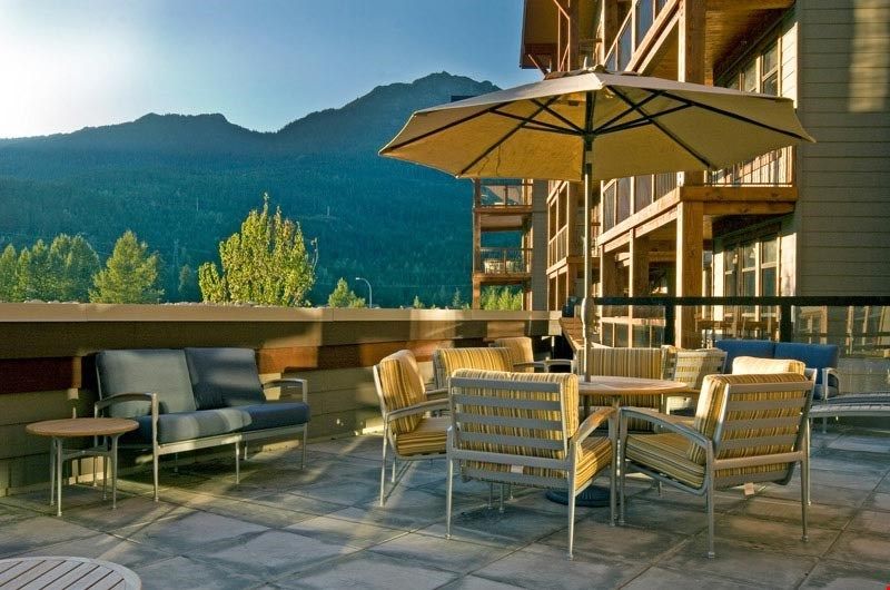 image Relax on the shared patio with other guests.