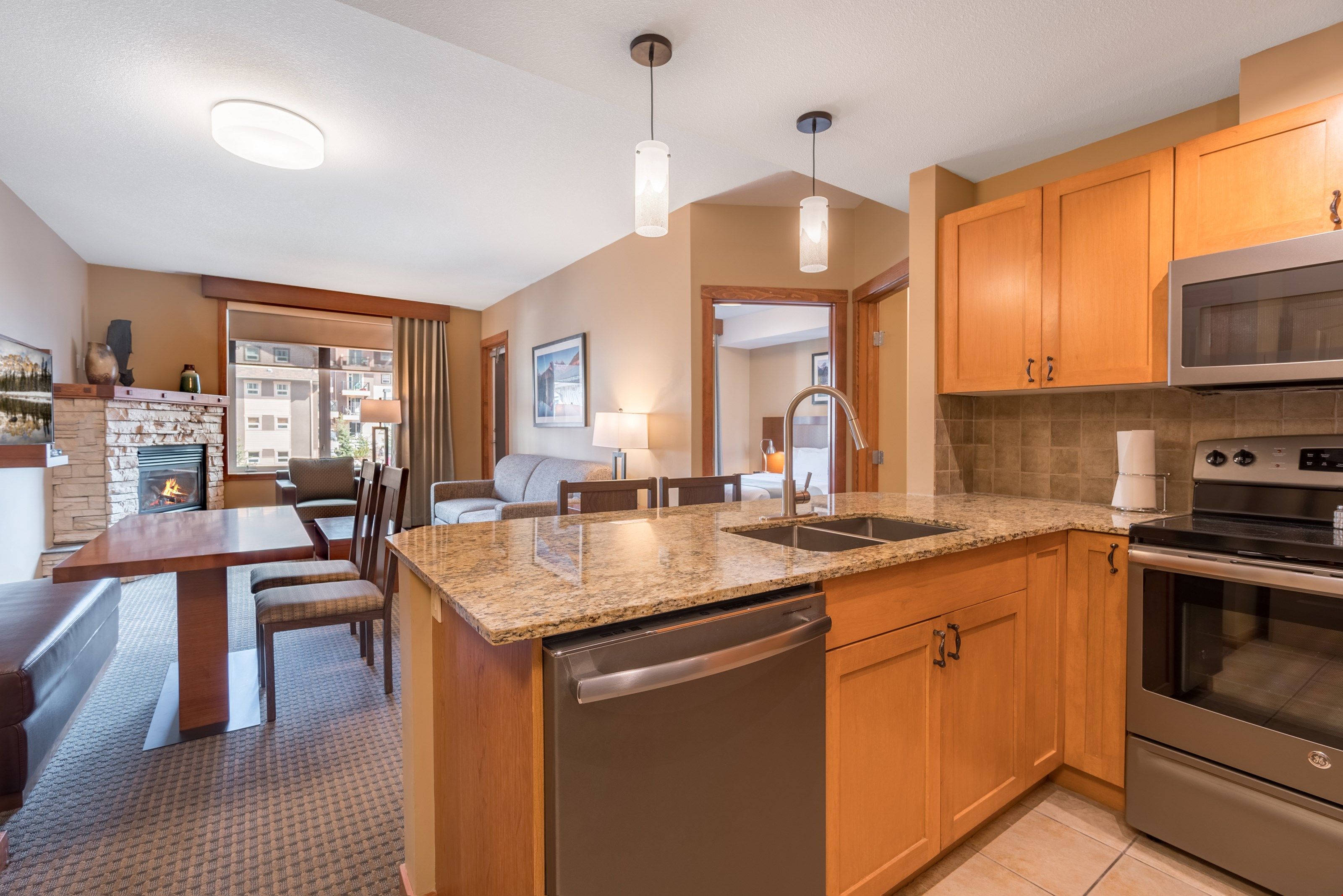 image The beautiful condo features a fully-equipped kitchen, a fireplace, and much more.