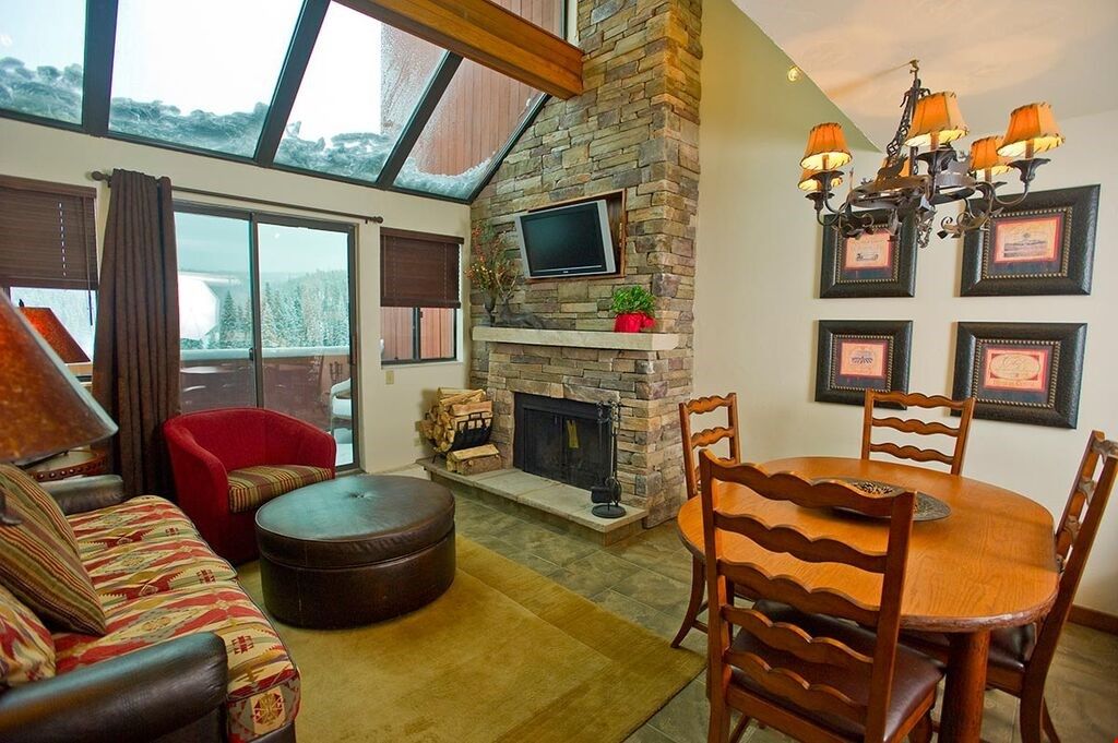 image Return to the suite after a day on the slopes, and warm your toes in front of the wood burning fireplace.