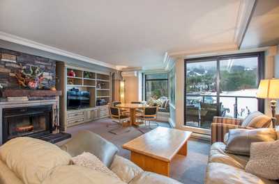 Kick back your feet and relax in the spacious, bright living room.