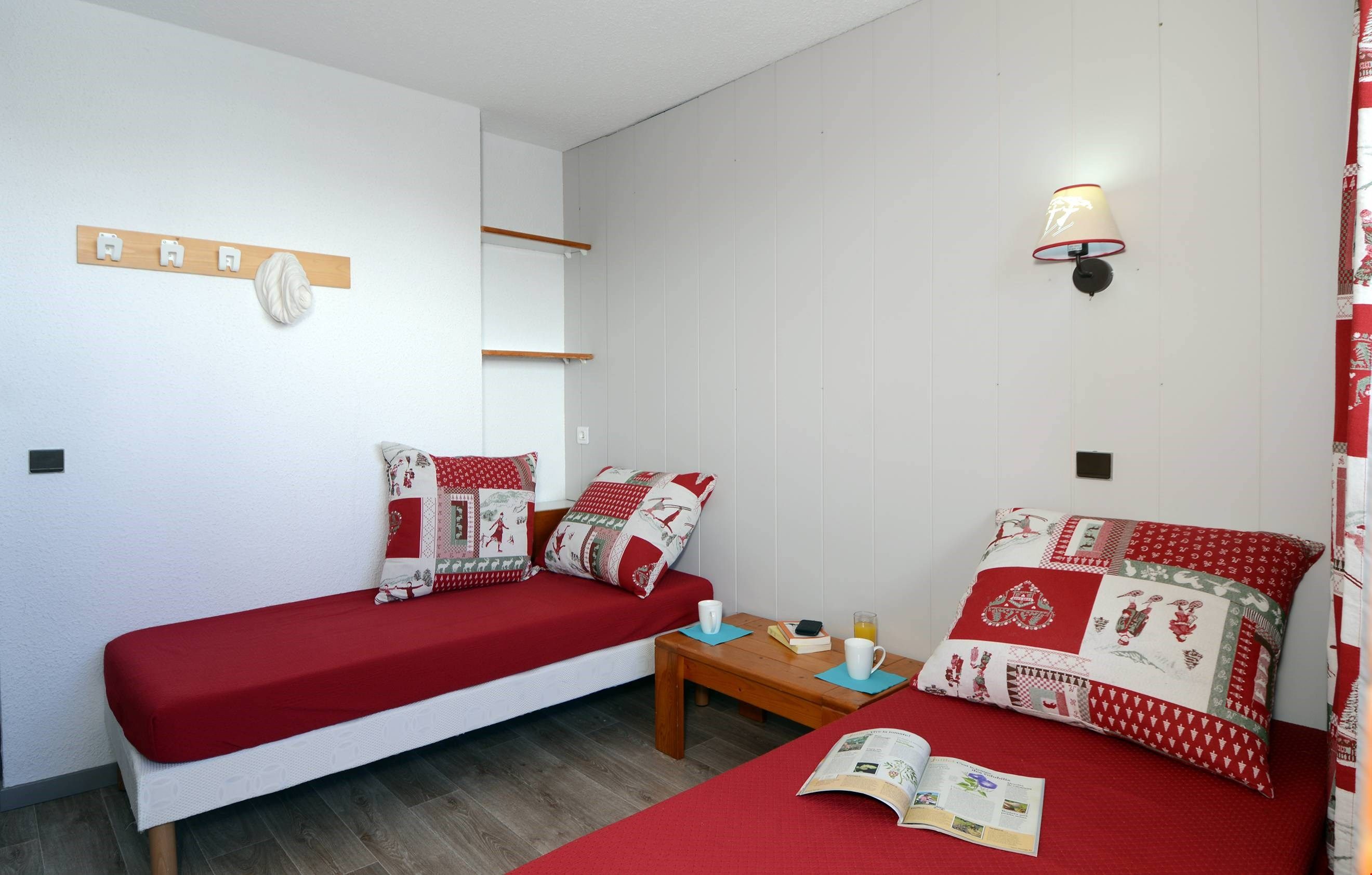 image There's a bedroom with 2 Single beds and a mezzanine with Bunks.
