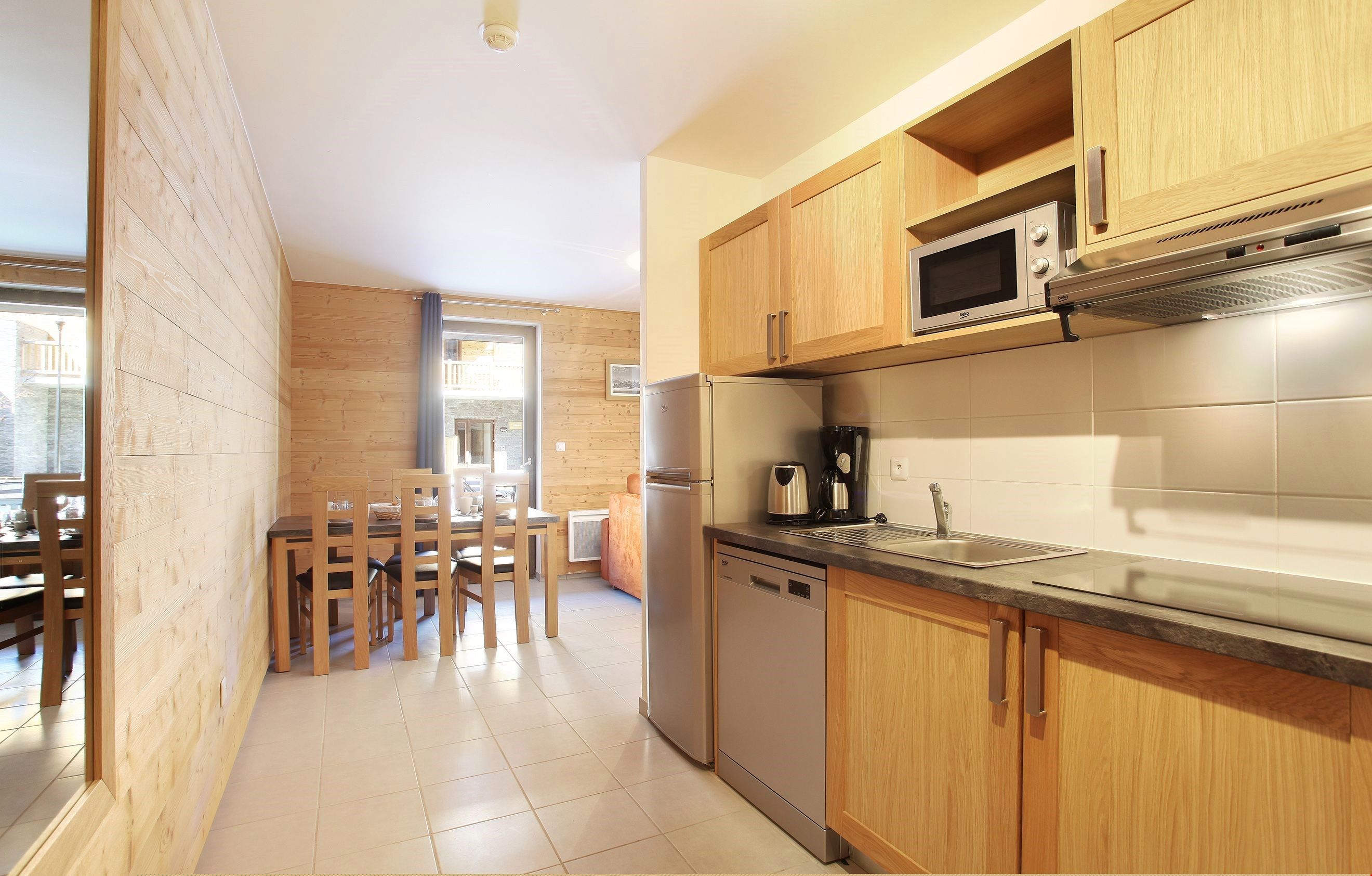 image Prepare simple meals in the functional kitchenette in both apartments.