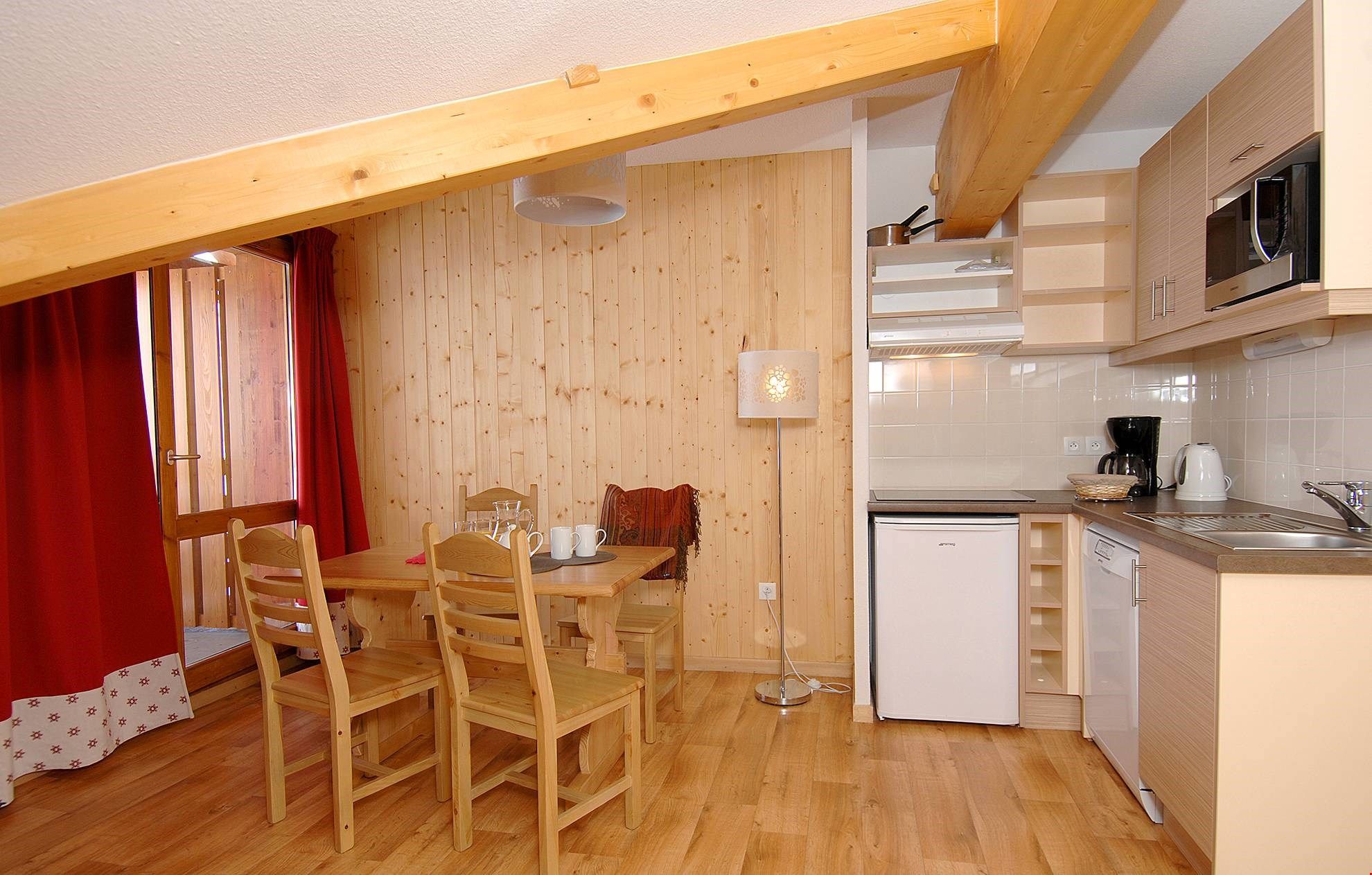 image Settle into the dining area and enjoy a nice meal.