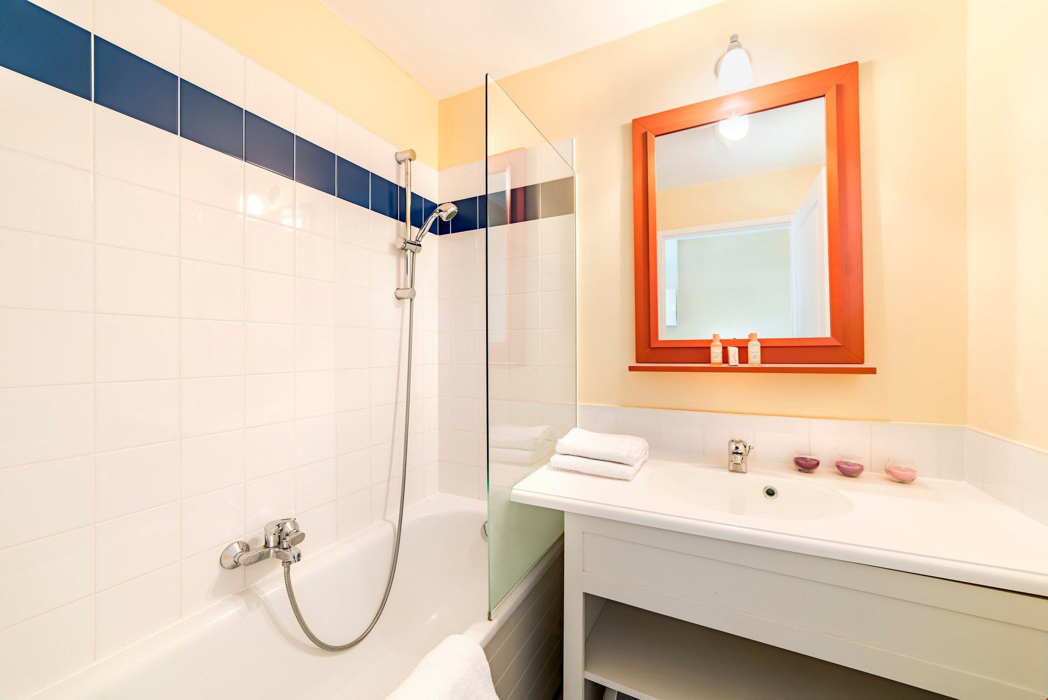 image Get ready for the day in the modern and bright bathroom.