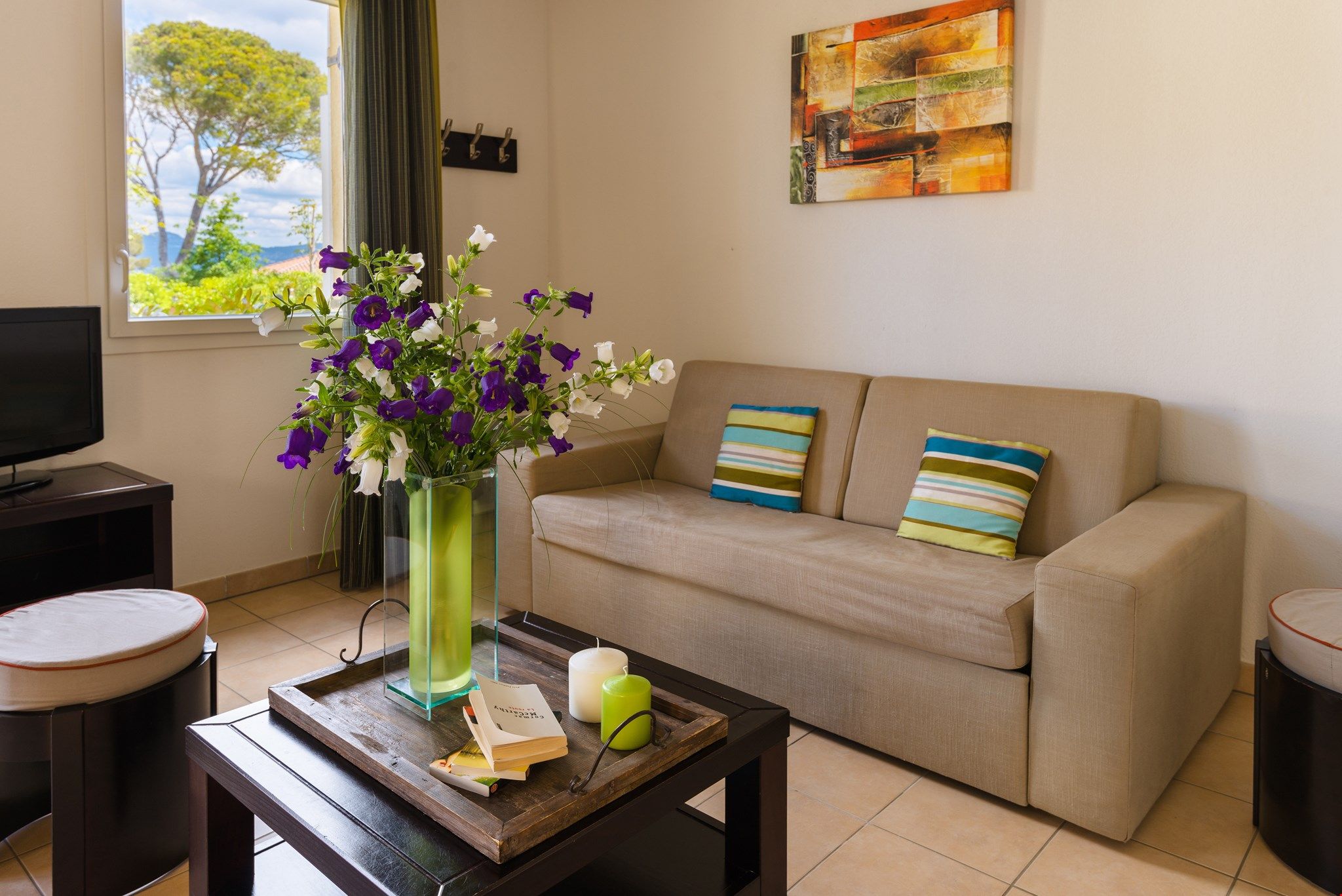 image Sink into the plush sofas around the coffee table.
