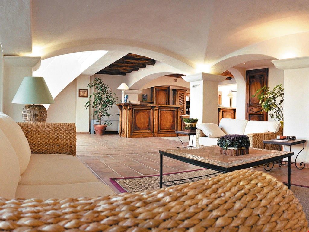 image Relax and unwind in the cozy, well-appointed living room.