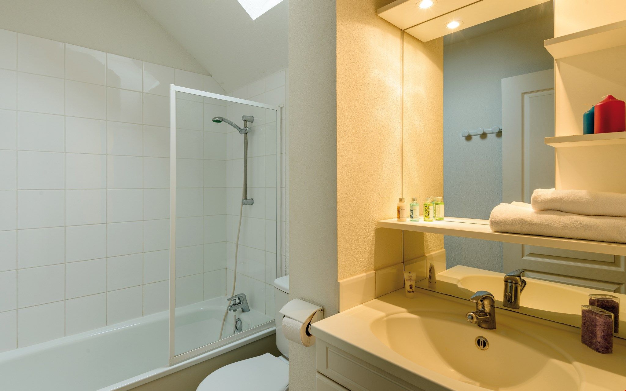 image Get ready for the day in the bright bathroom.