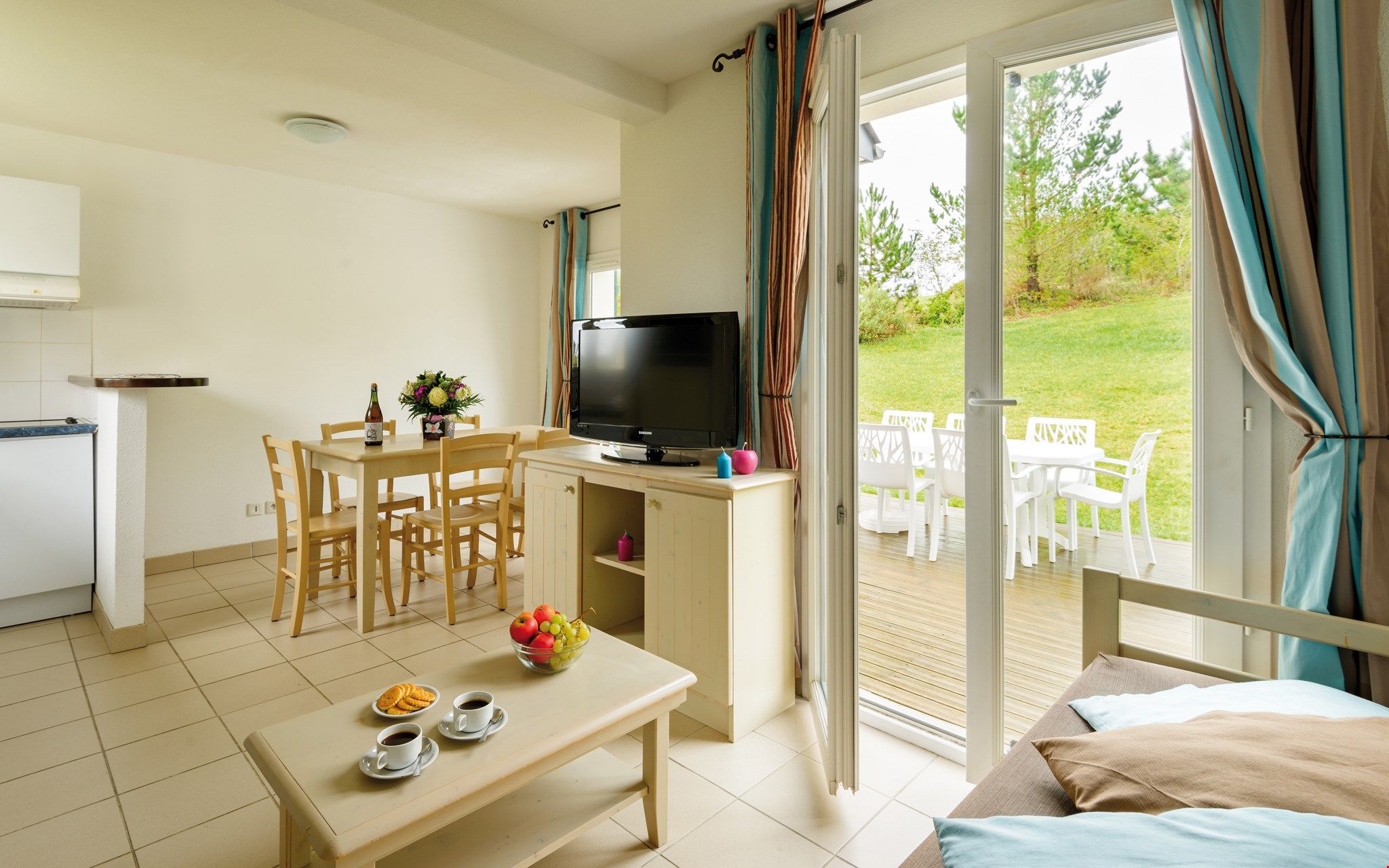 image Find peace and relaxation with your close friends and family in this stunning open-concept living room featuring natural decor.