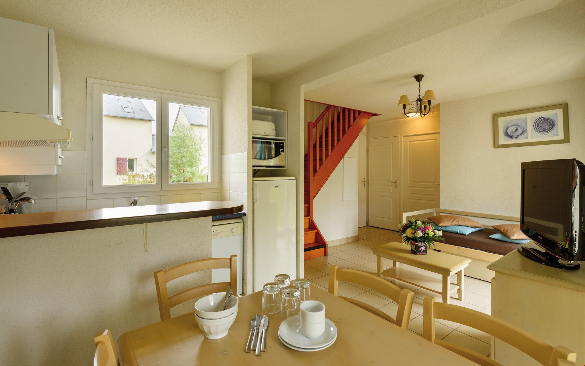 image Loads of room at the dining table and the open concept is always nice for the cook.