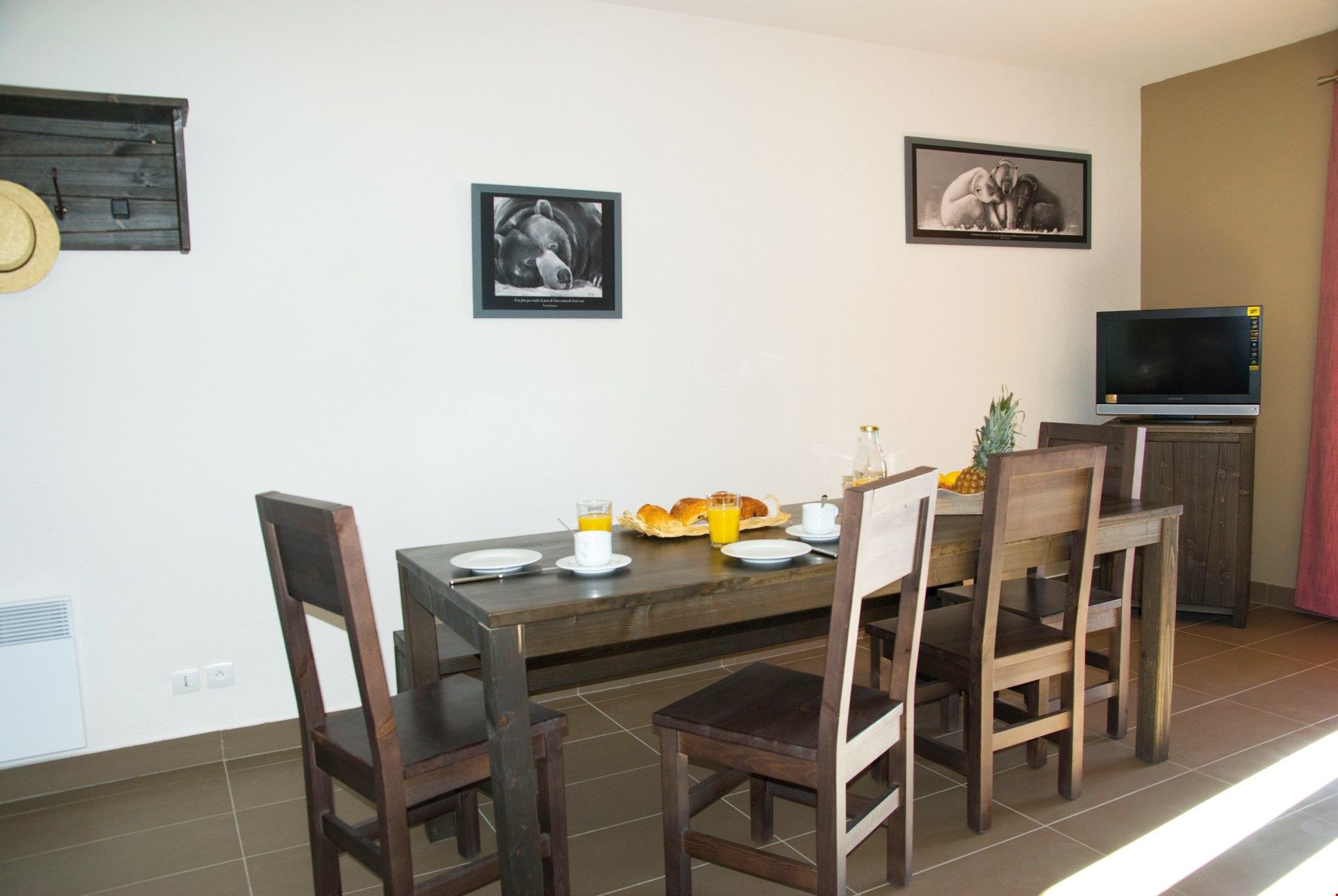 image Tuck into a great meal in your dining area.