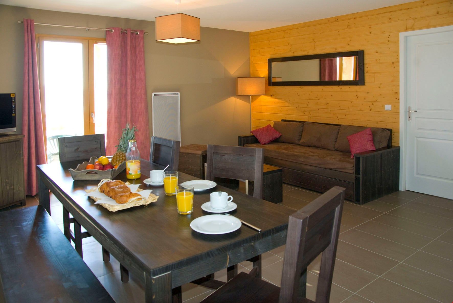image Settle into the dining area and enjoy a nice meal.