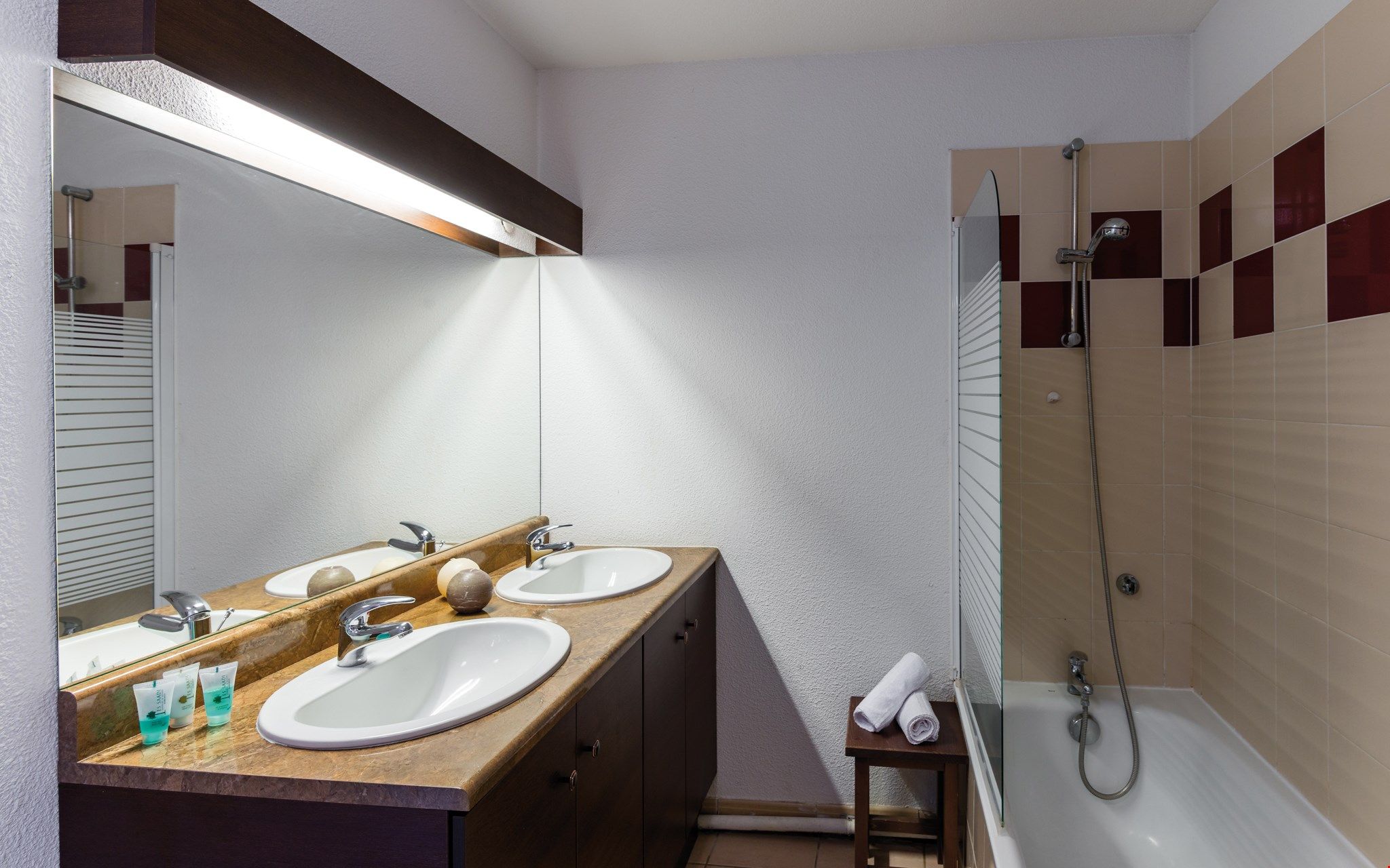 image The bathroom is bright and has everything you need to get ready for your day.