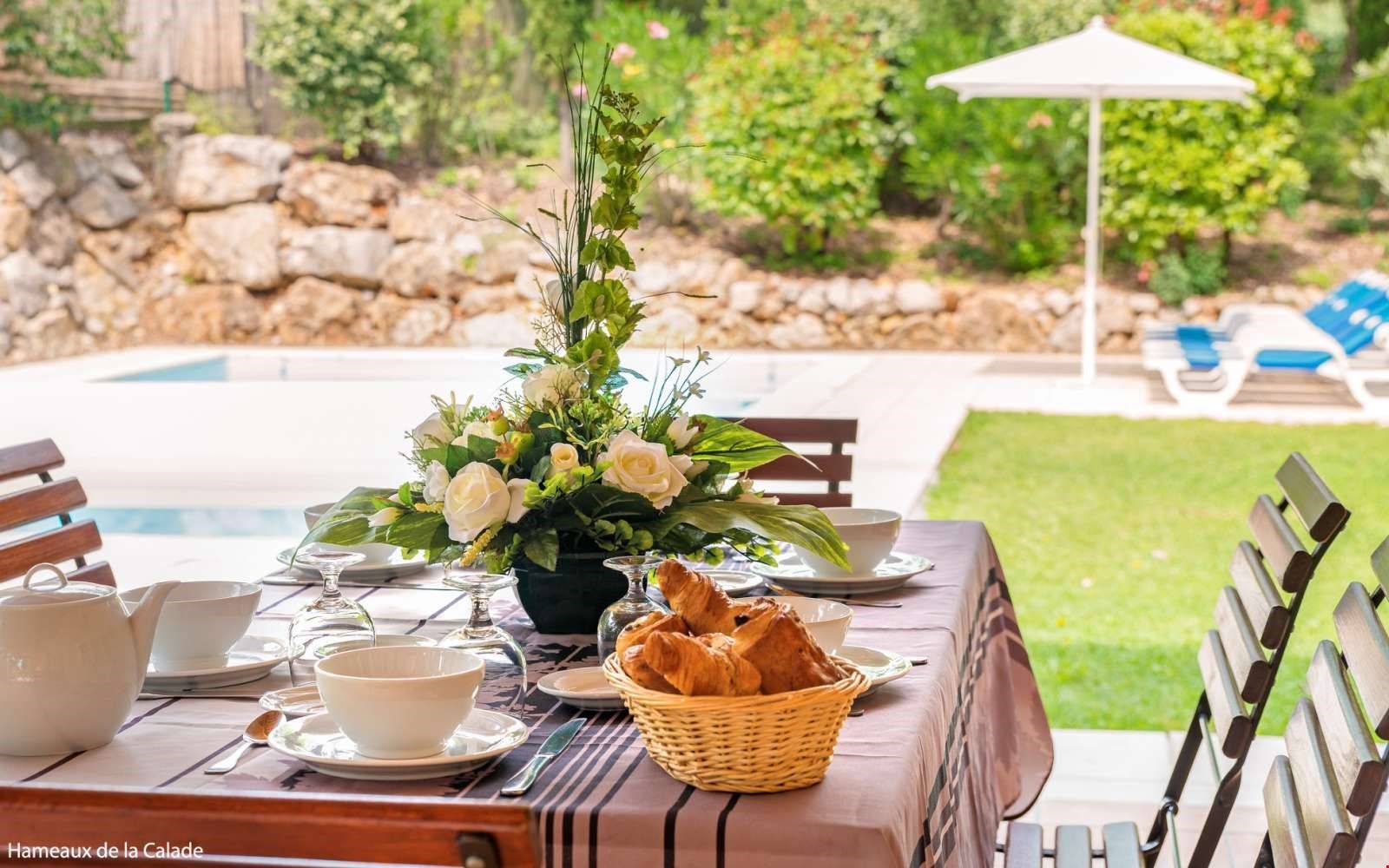 image Relax and unwind on the outdoor terrace next to your private pool.