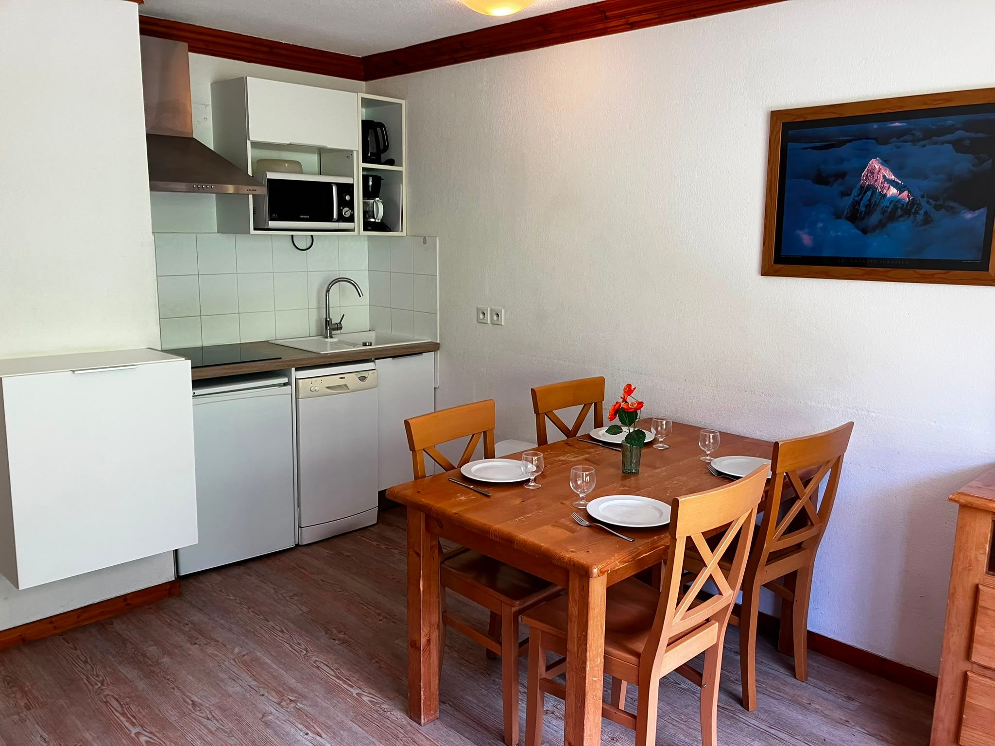 image Whip up quick meals in the kitchenette, stocked with a microwave and dishwasher