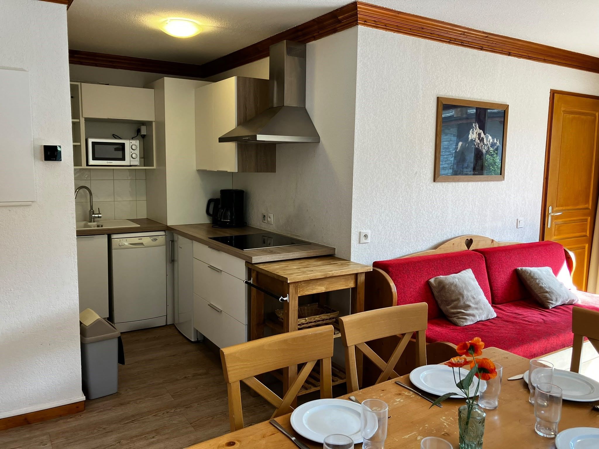 image The kitchenette comes stocked with a stove and dishwasher for meals after skiing