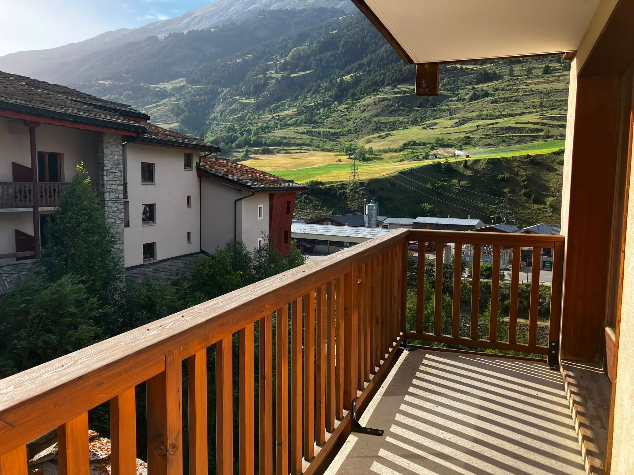 image Wood accents throughout the room echo the chalet's mountain character