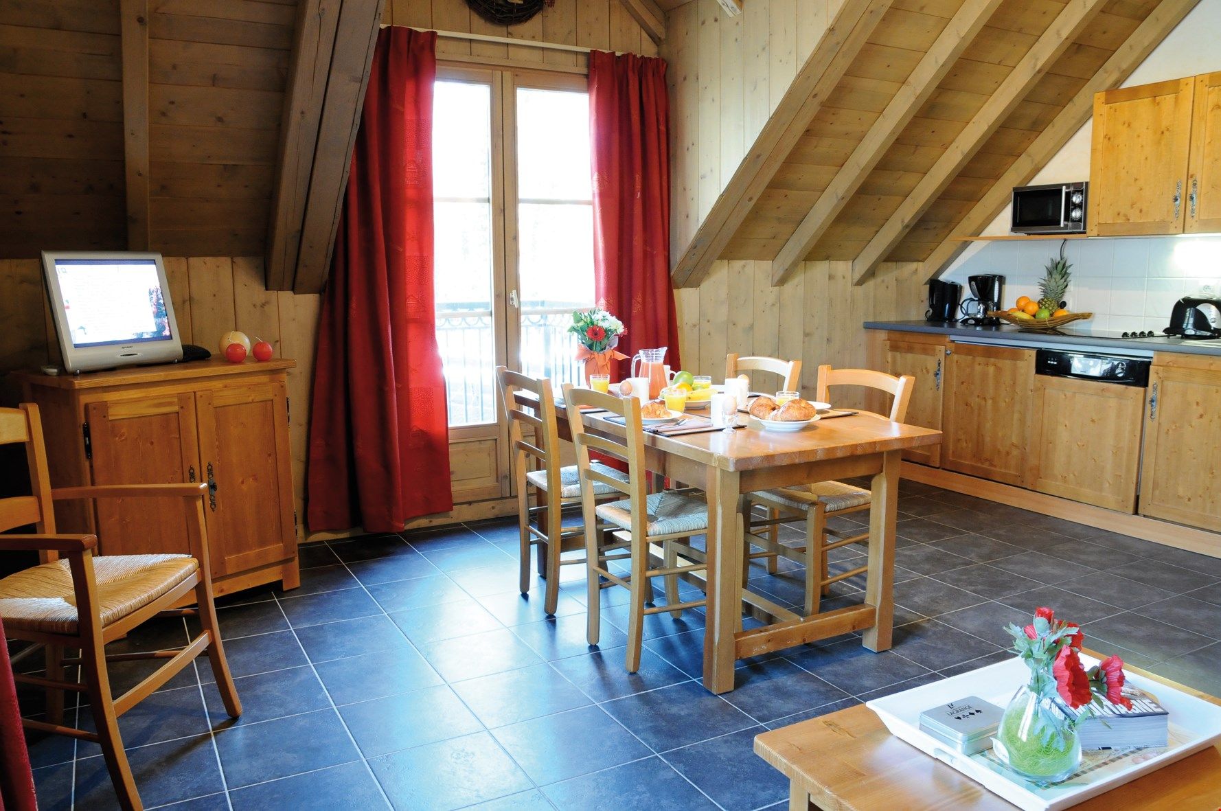 image Loads of room at the dining table and the open concept is always nice for the cook.