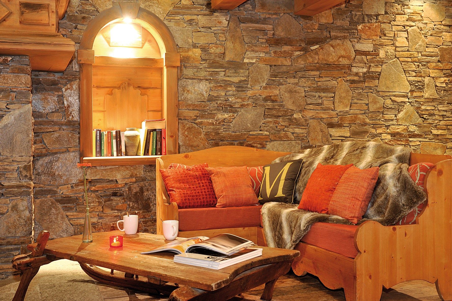 image Find peace and relaxation with your close friends and family in this stunning open-concept living room featuring natural decor.