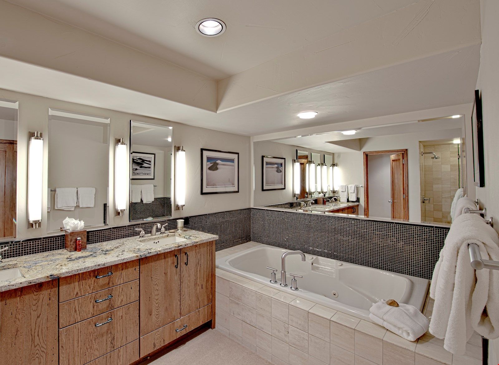 image Get ready for the day ahead in the large and bright master bathroom.