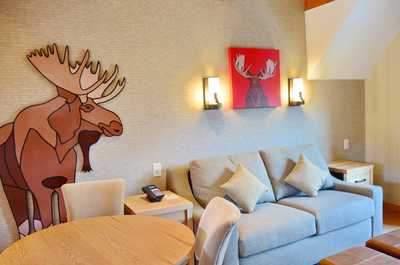 Snuggle up with a cup of coffee or tea on the comfortable sofa in front of the gas fireplace.