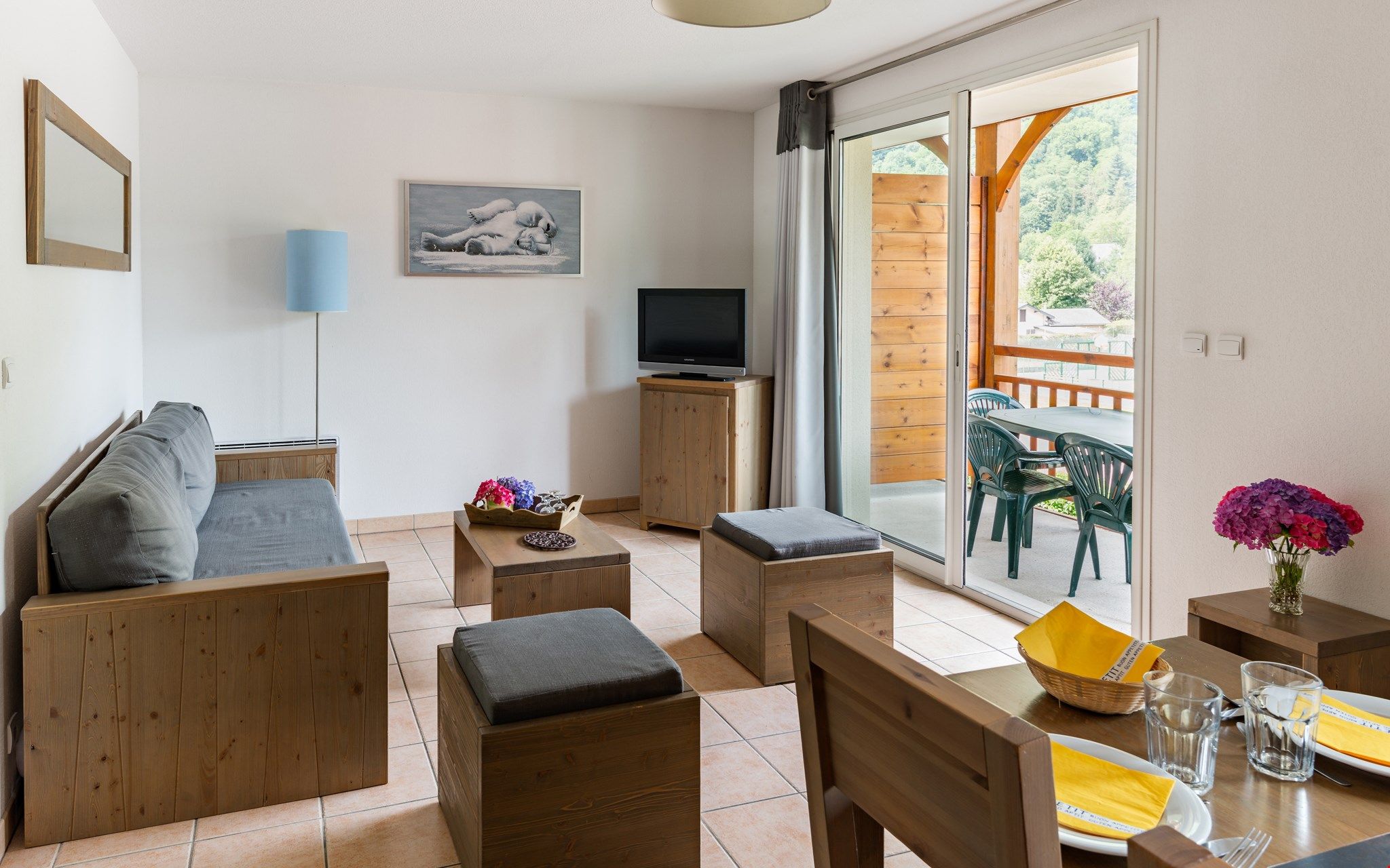 image Relax and unwind in the cozy and open-plan living area.