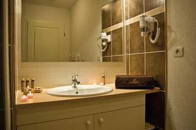 There is an additional half bathroom for your convenience.