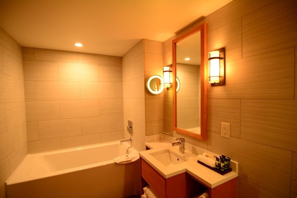 image Prepare for your day outside in the spacious bathroom.