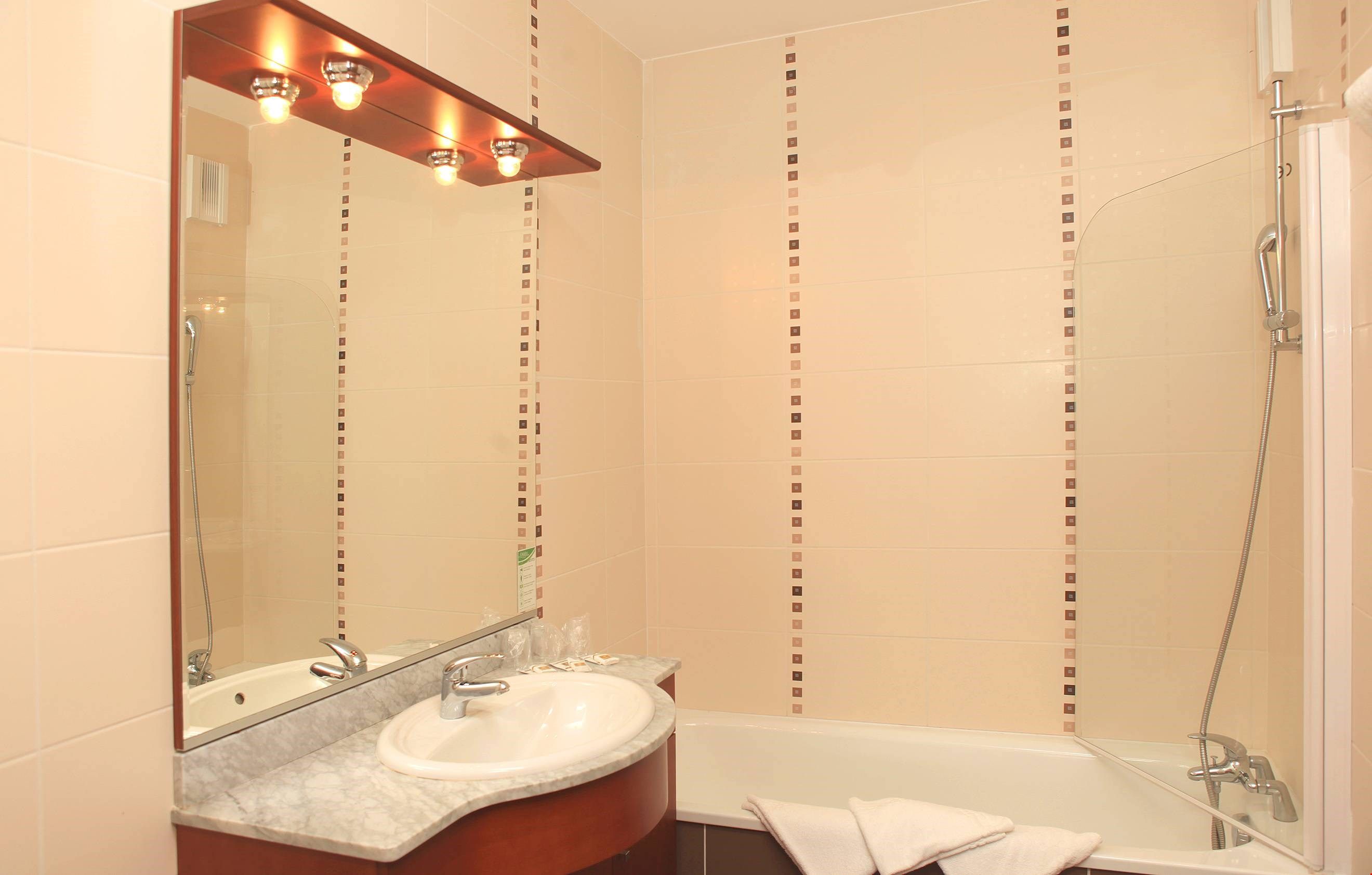 image Prepare for your day outside in the spacious bathroom.