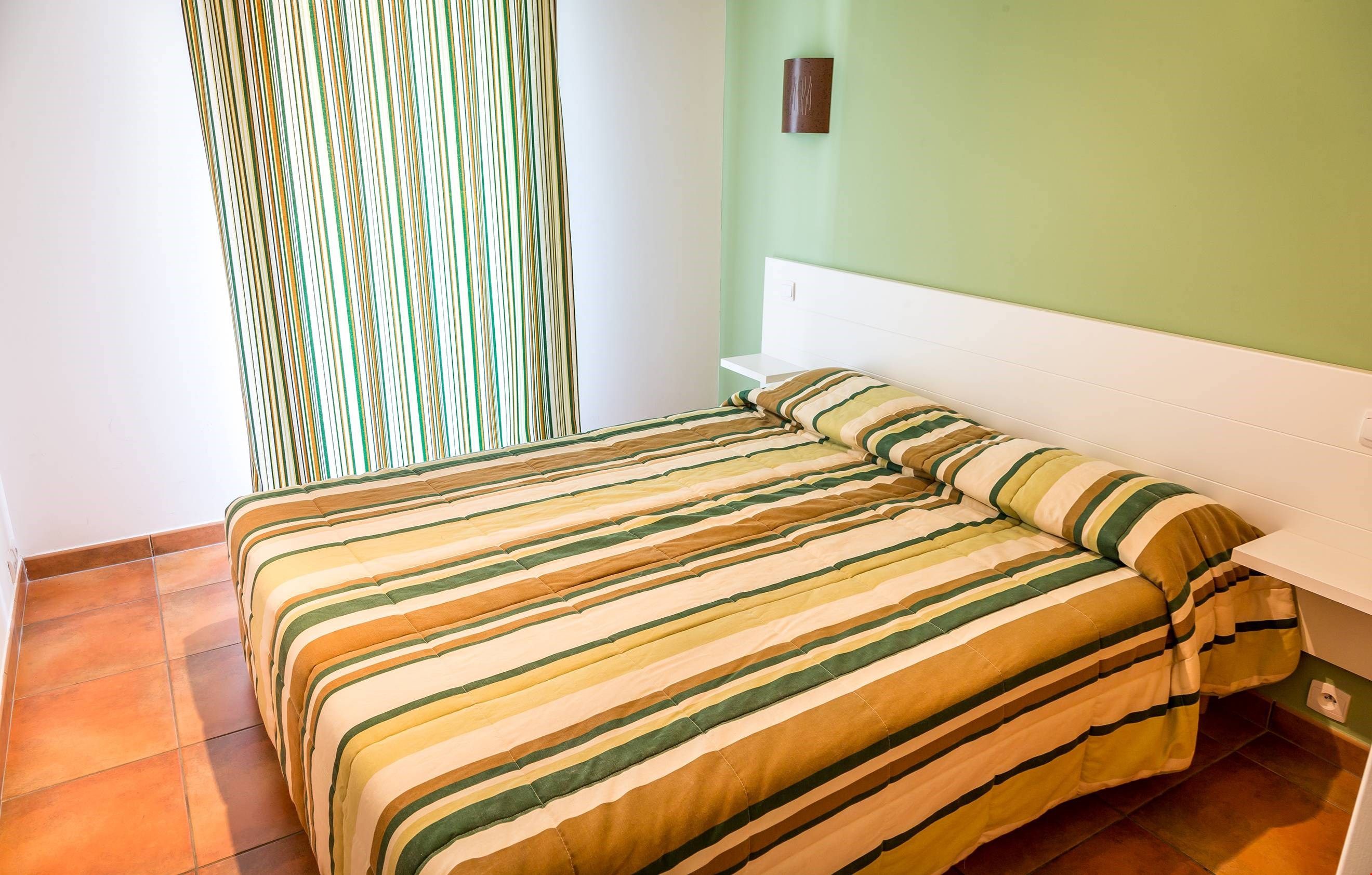 image The master bedroom features a luxurious double bed