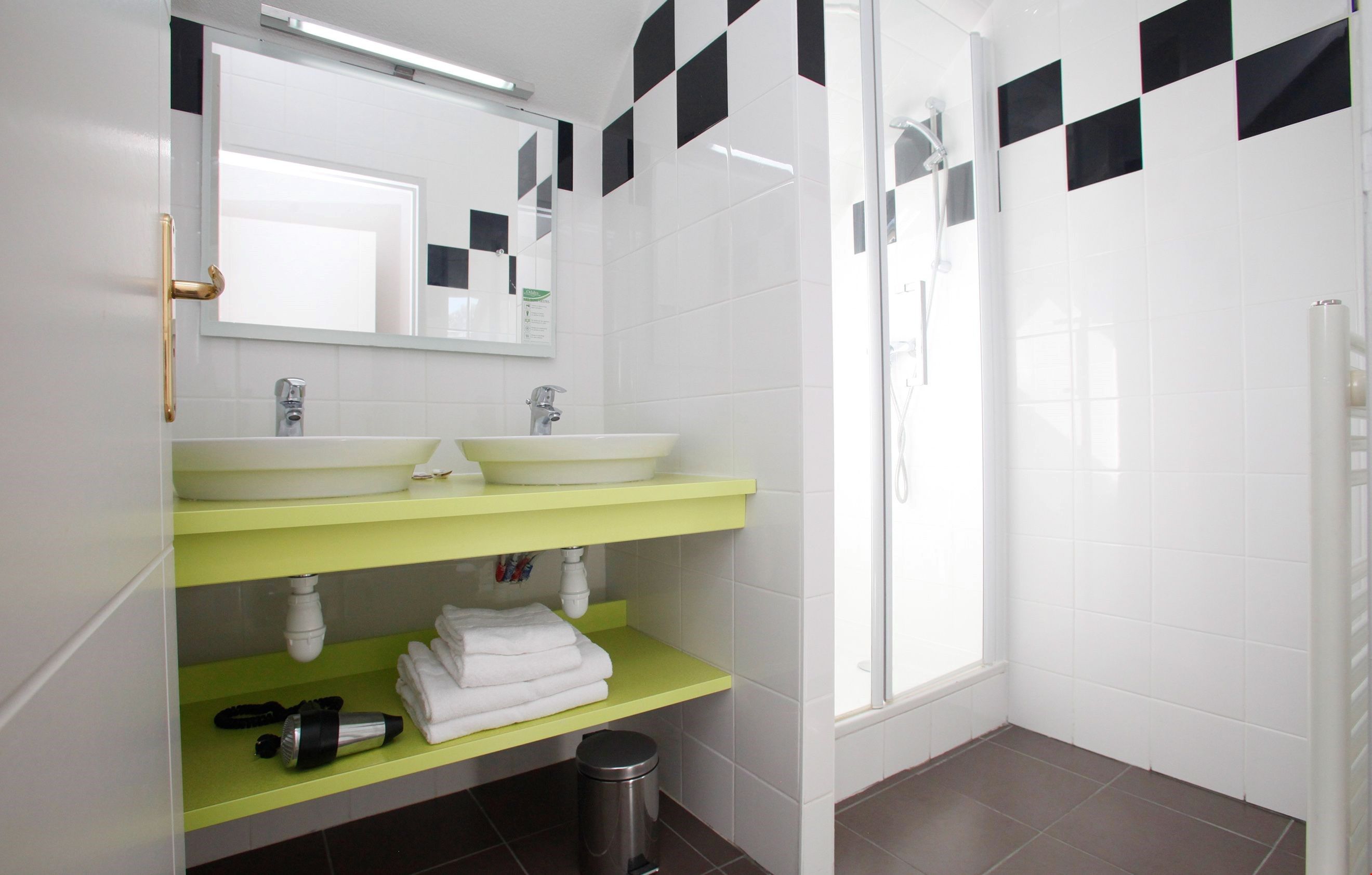 image Prepare for your day outside in the spacious bathroom.