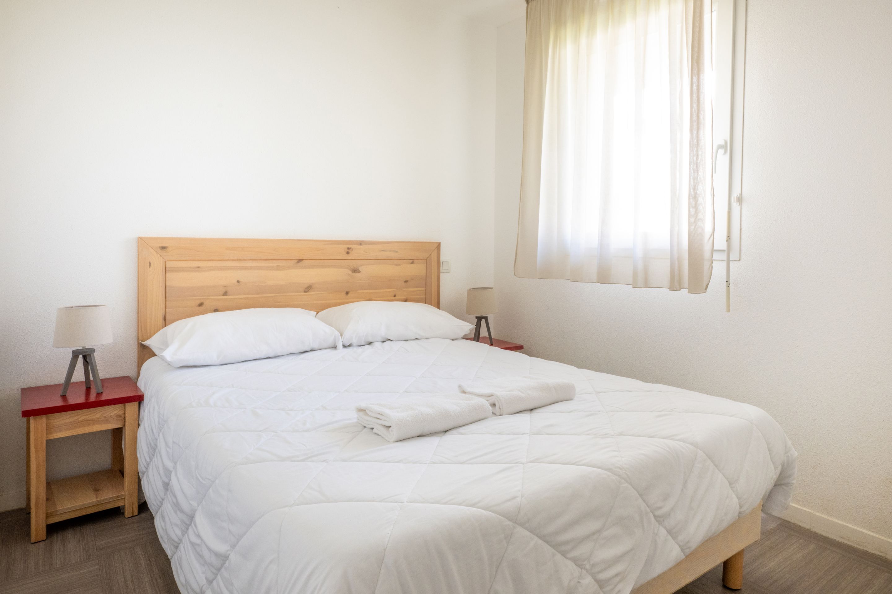 image Come back from the beach and settle into the bedroom before heading out for dinner.