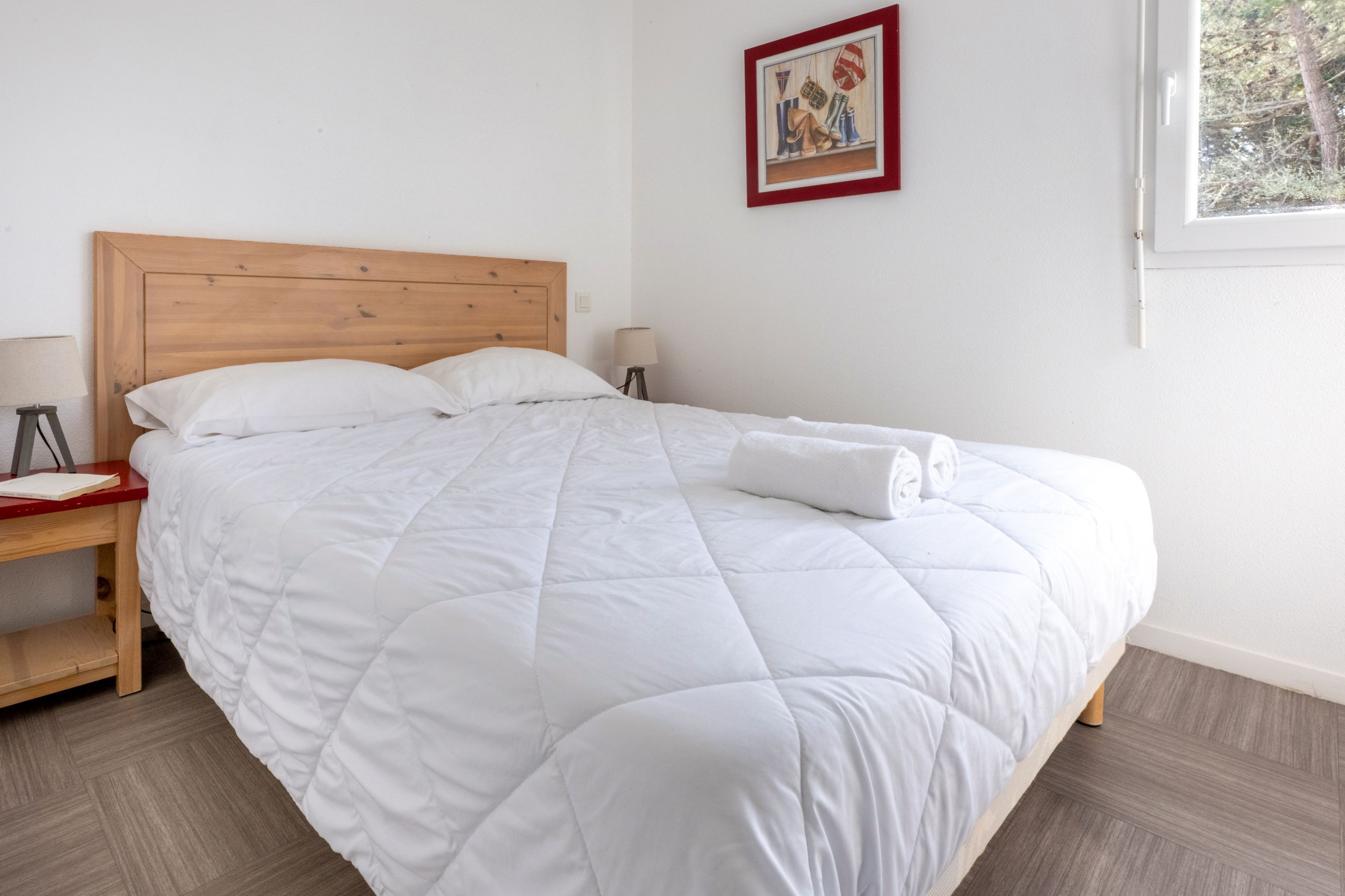 image Rest up in this bedroom after a walk along the coastal path.