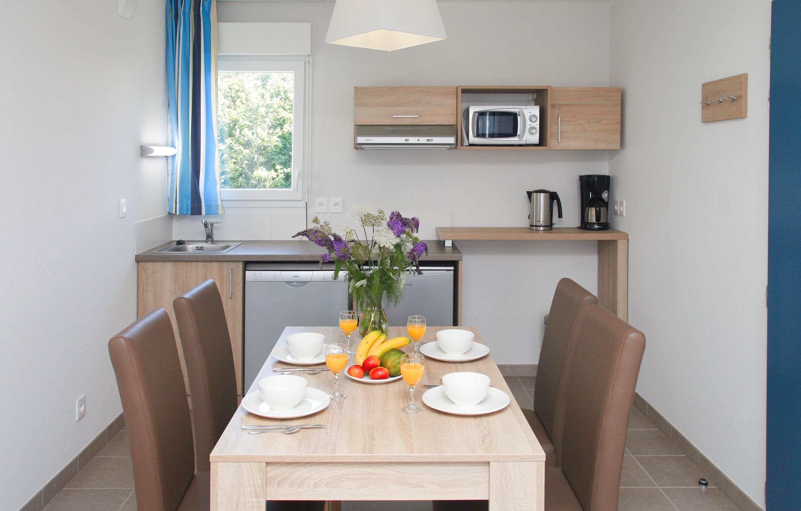 image Share meals and laughs at the dining table.