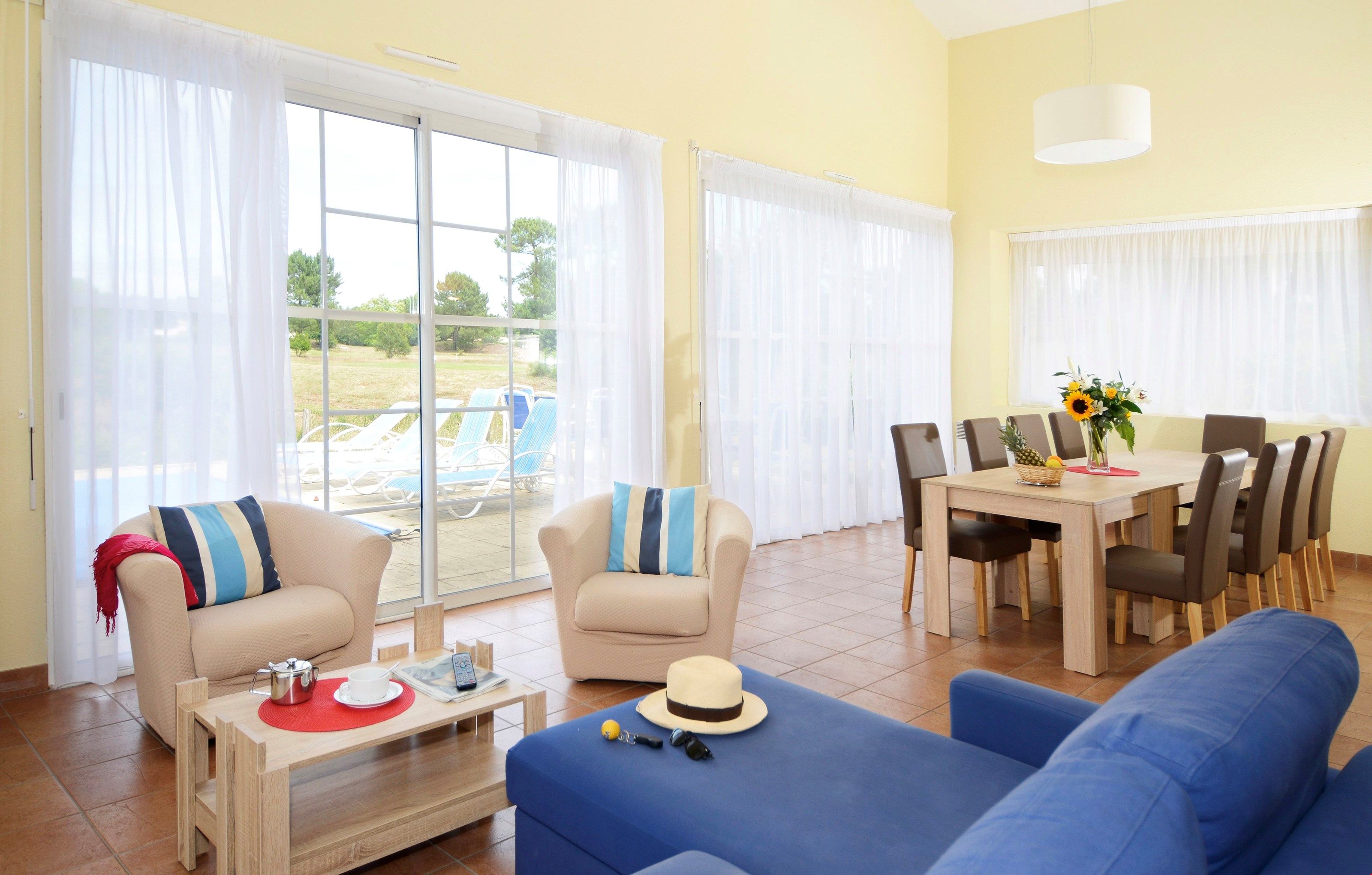 image Sit back and relax on the plush sofas after a great day.