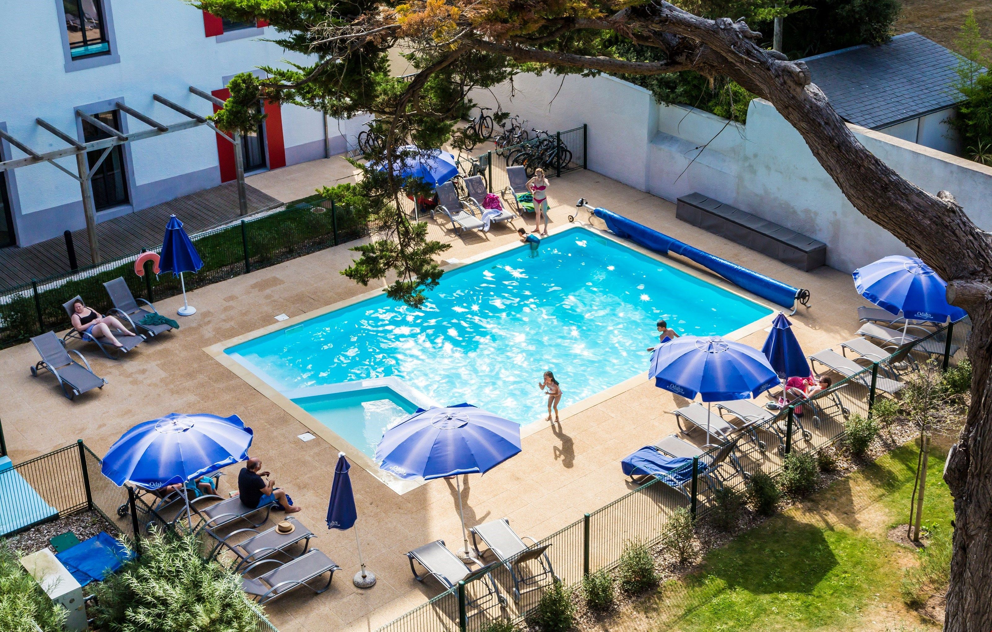 image Dive into the lovely outdoor pool during the summer.