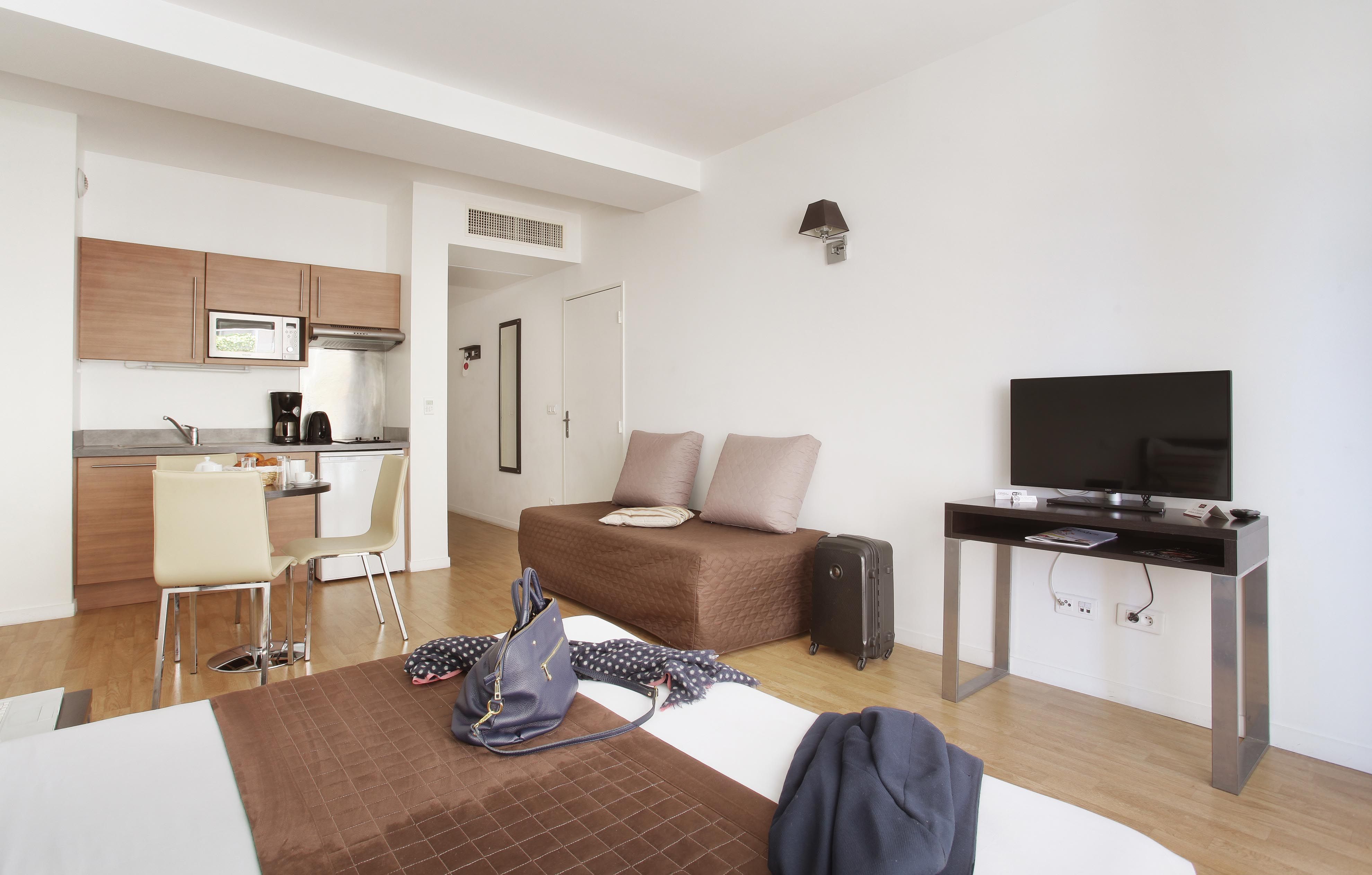 image Make yourself at home in this bright corner with seating for three and plenty of natural light.