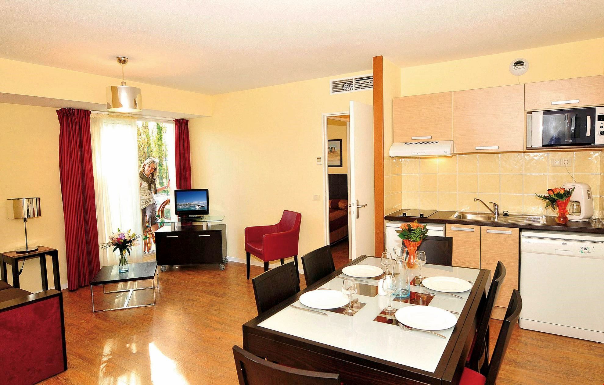 image Settle into the dining area and enjoy a nice meal.