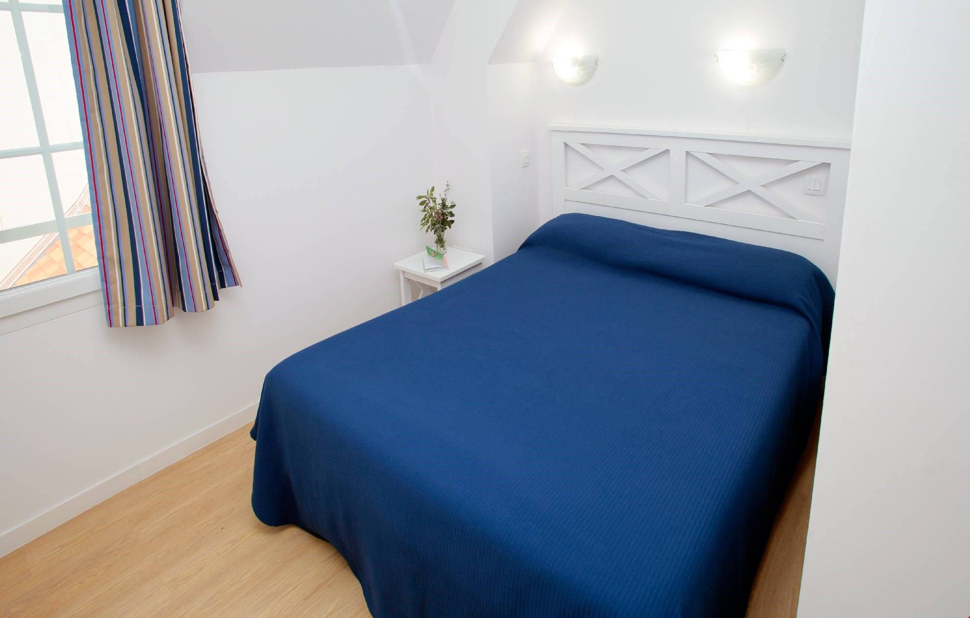 image Drift to sleep in the comfortable Double bed in the bedroom.