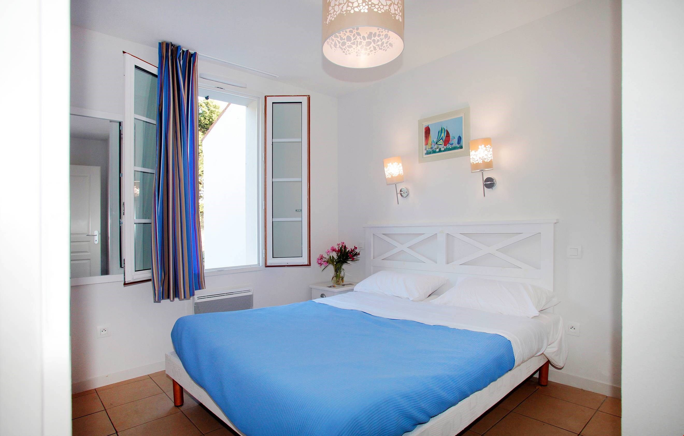 image Drift to sleep in the comfy Double bed in the bedroom.