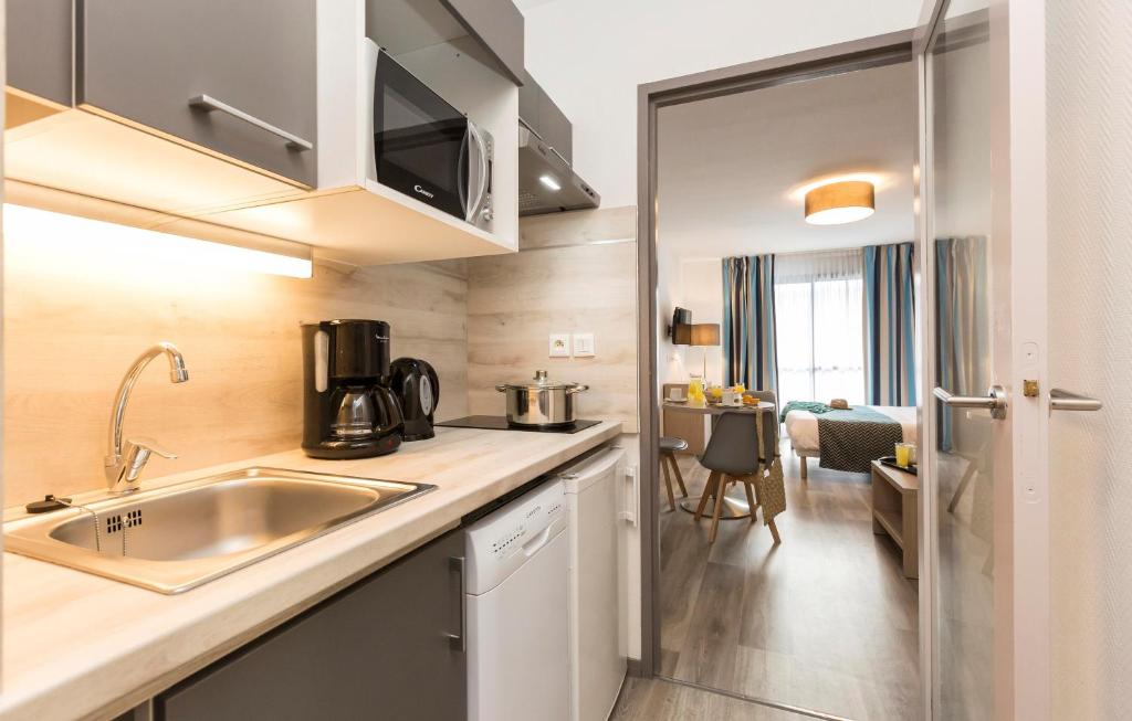 image Curb your appetite by indulging on a snack in your kitchenette!