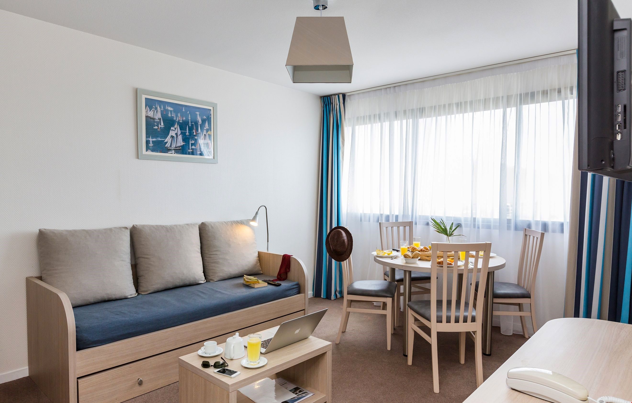 image Sit back and relax in our bright and cozy apartment in La Rochelle.